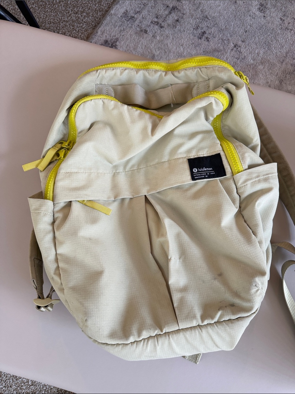 lululemon athletica cream yellow backpack with yellow accent